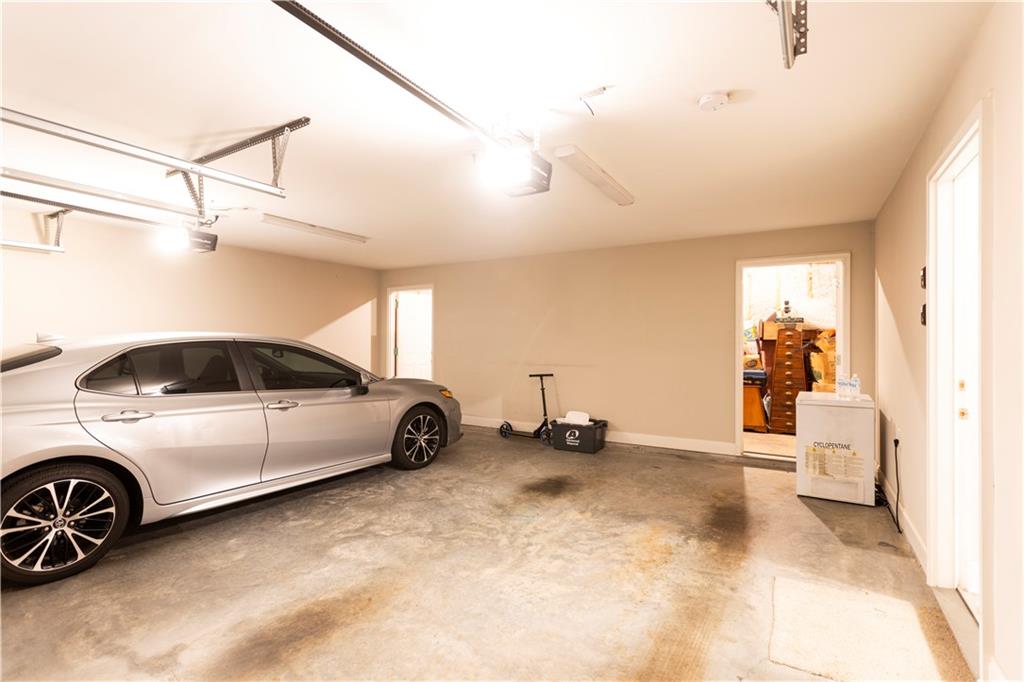 355 Conner Court Social Circle, GA 30025 - Photo 40 of 52 a view of a car in garage