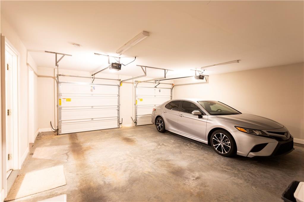 355 Conner Court Social Circle, GA 30025 - Photo 41 of 52 a car parked in a garage