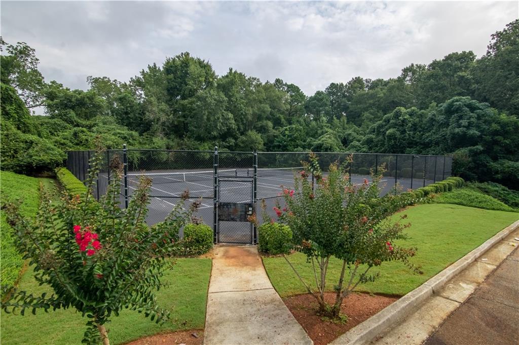 355 Conner Court Social Circle, GA 30025 - Photo 50 of 52 a view of a garden with a fountain