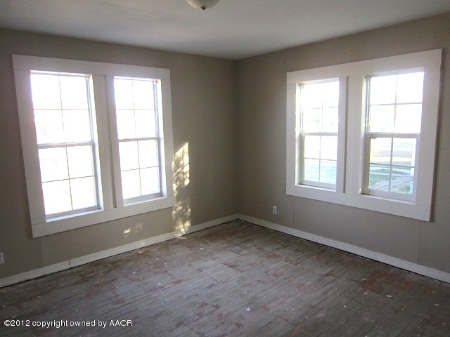 4216 South Harrison Street Amarillo, TX 79110 - Photo 5 of 14 an empty room with a window