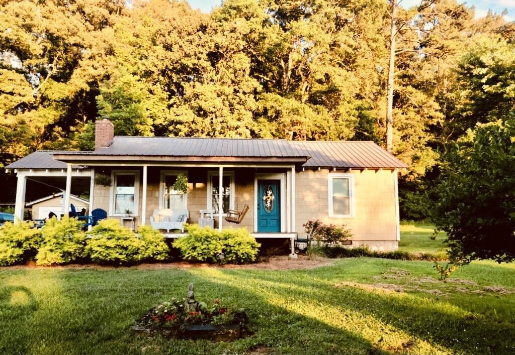 front view of a house with a yard
