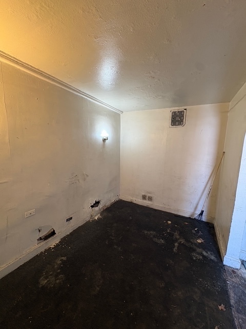 6408 South Rhodes Avenue Chicago, IL 60637 - Photo 2 of 19 wooden floor in an empty room