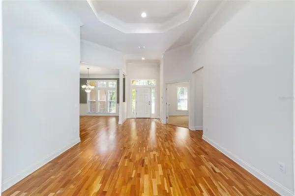 a view of a room with cabinet and windows