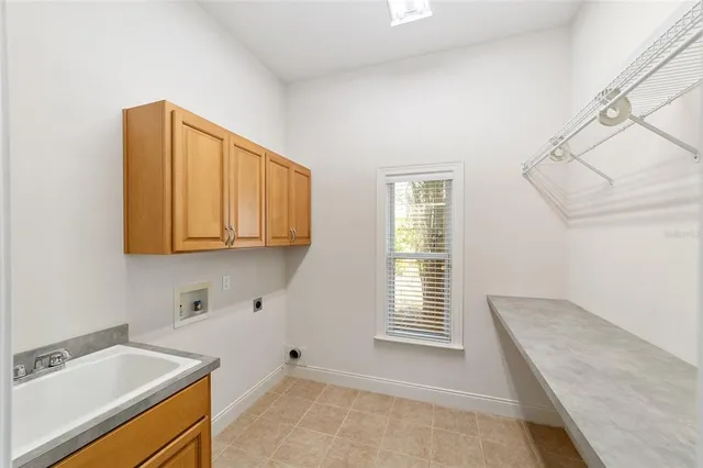 a front view of a house with a yard and a garage