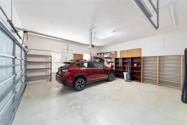 a view of a house with a yard and plants