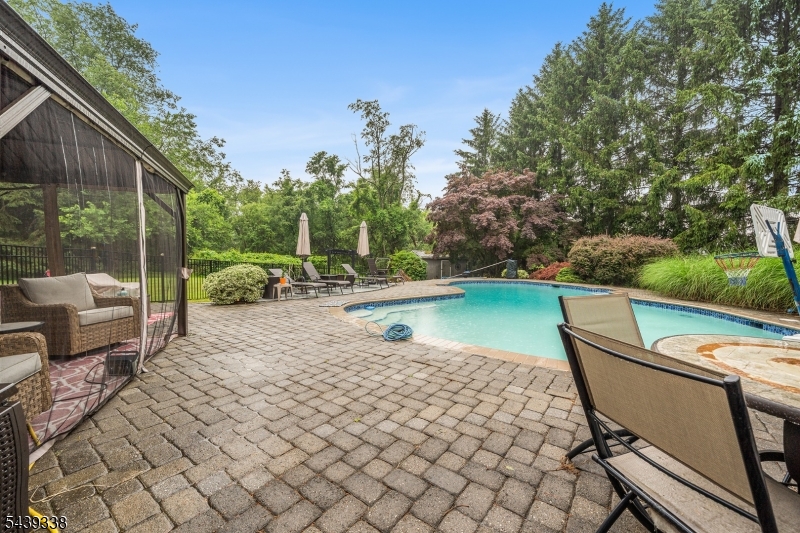 1 Oak Grove Road Flemington, NJ 08822 - Photo 27 of 29 a view of a lake with lawn chairs