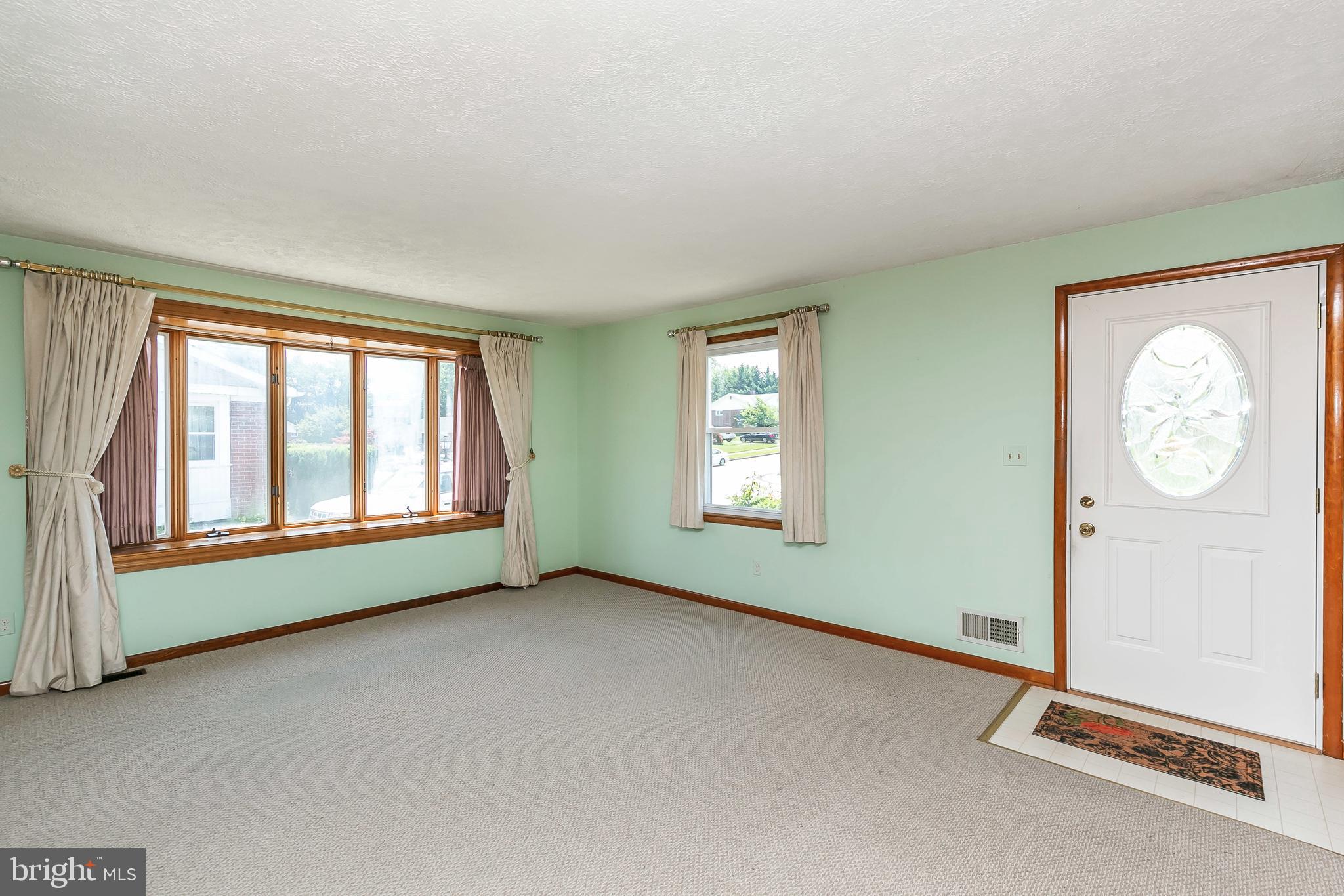 2314 Cider Mill Road Baltimore, MD 21234 - Photo 3 of 32 Spacious Living Room with Bow Window
