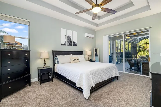 a kitchen with granite countertop a refrigerator stove top oven and sink