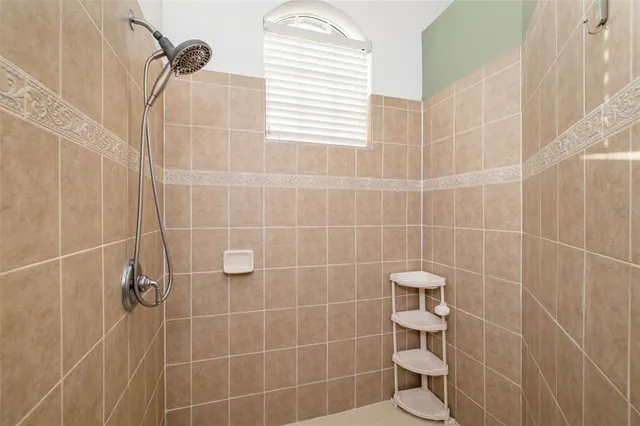 a view of swimming pool with a yard and sitting area