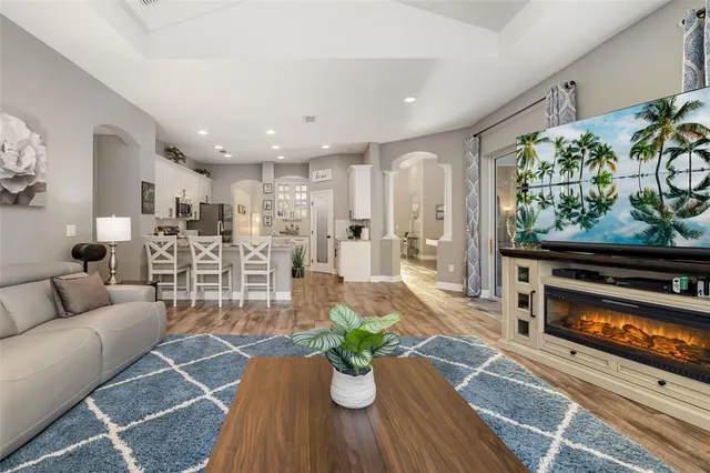 a living room with furniture and a window