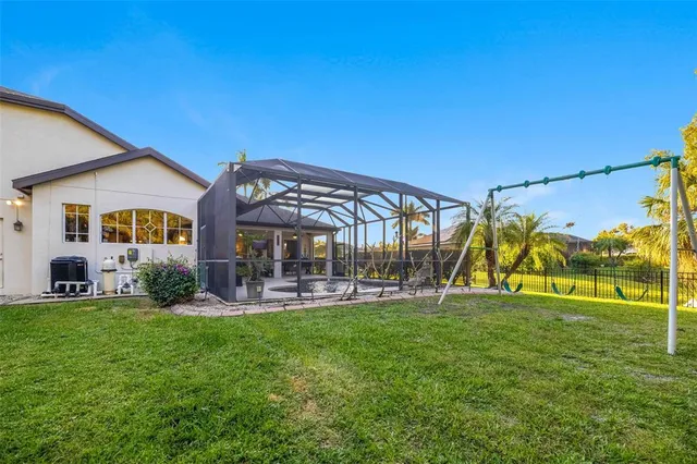 a view of a house with a swimming pool