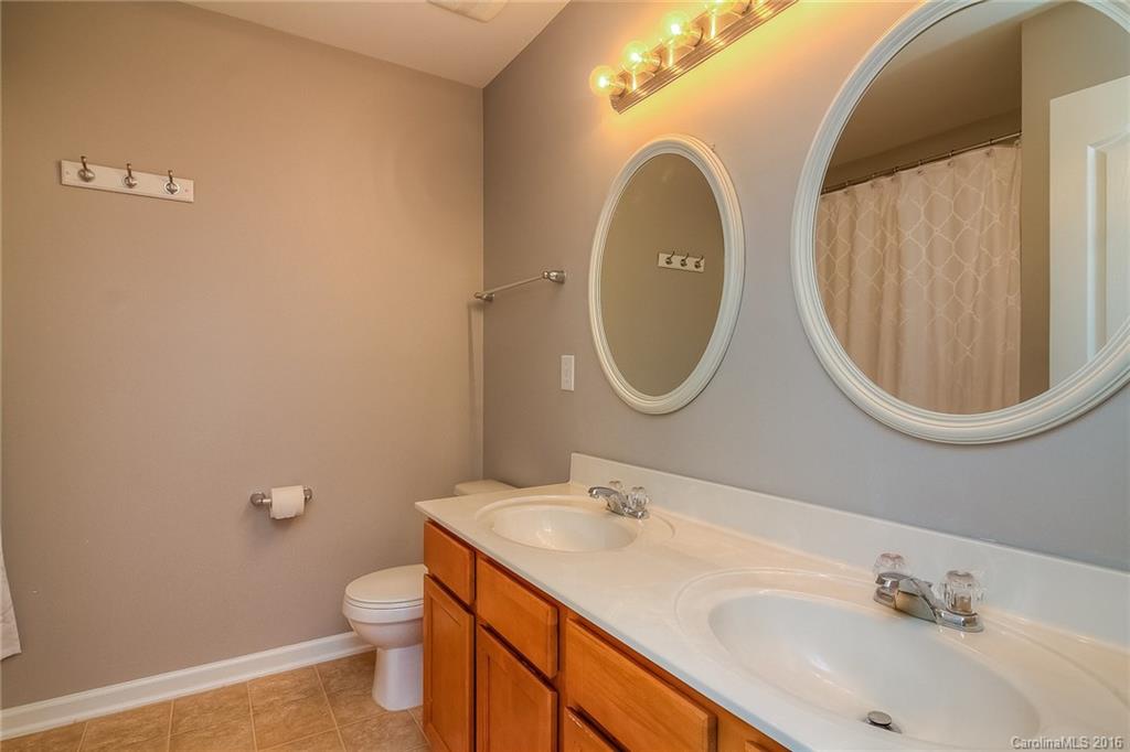 2187 Durand Road Fort Mill, SC 29715 - Photo 22 of 24 a bathroom with a sink and a mirror