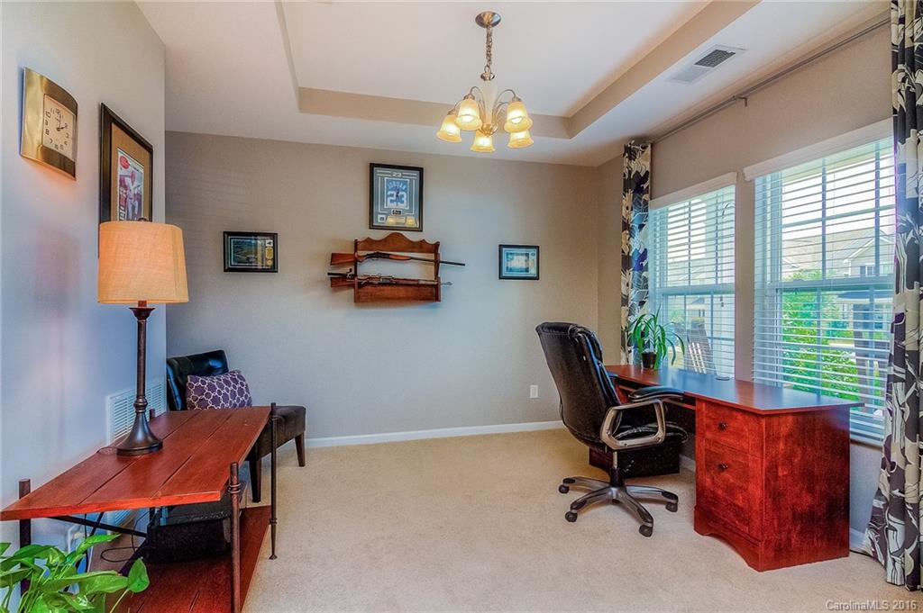 2187 Durand Road Fort Mill, SC 29715 - Photo 4 of 24 a workspace with furniture and a window