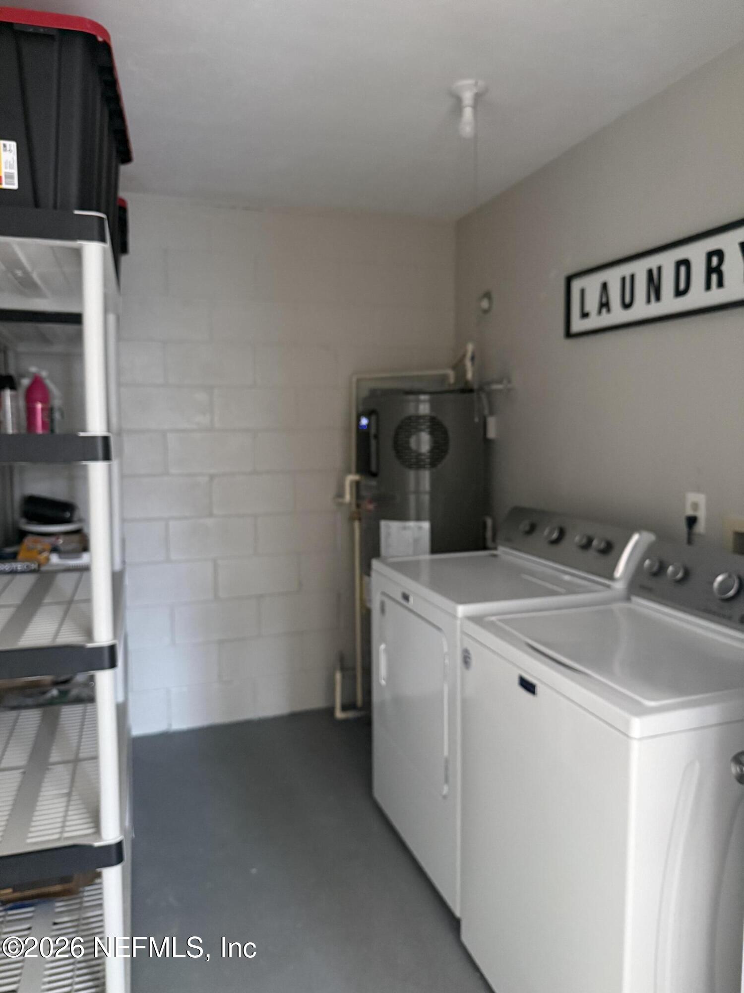 2360 Bitternut Way Jacksonville, FL 32246 - Photo 18 of 26 a utility room with dryer and washer