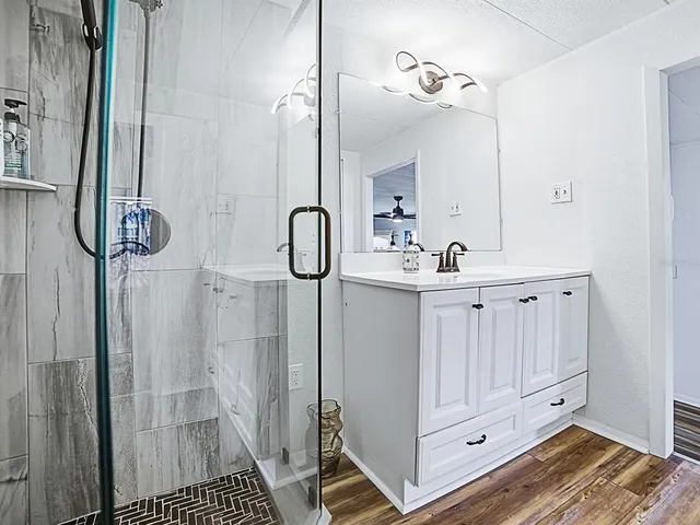 a bathroom with a sink and a mirror