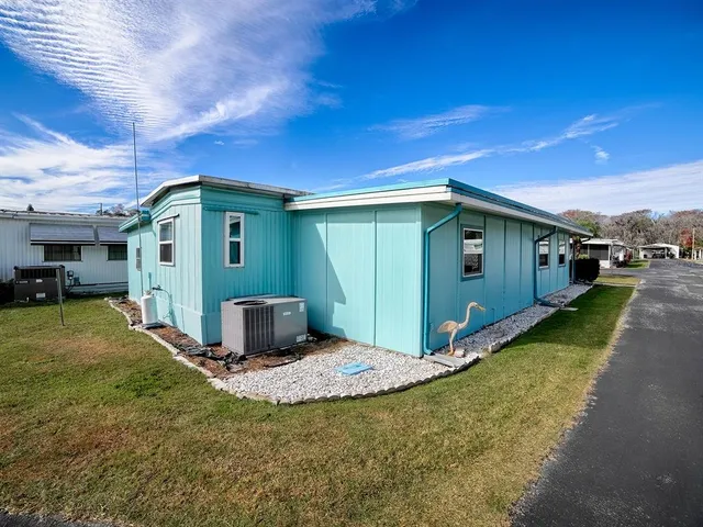 a view of a back yard of the house