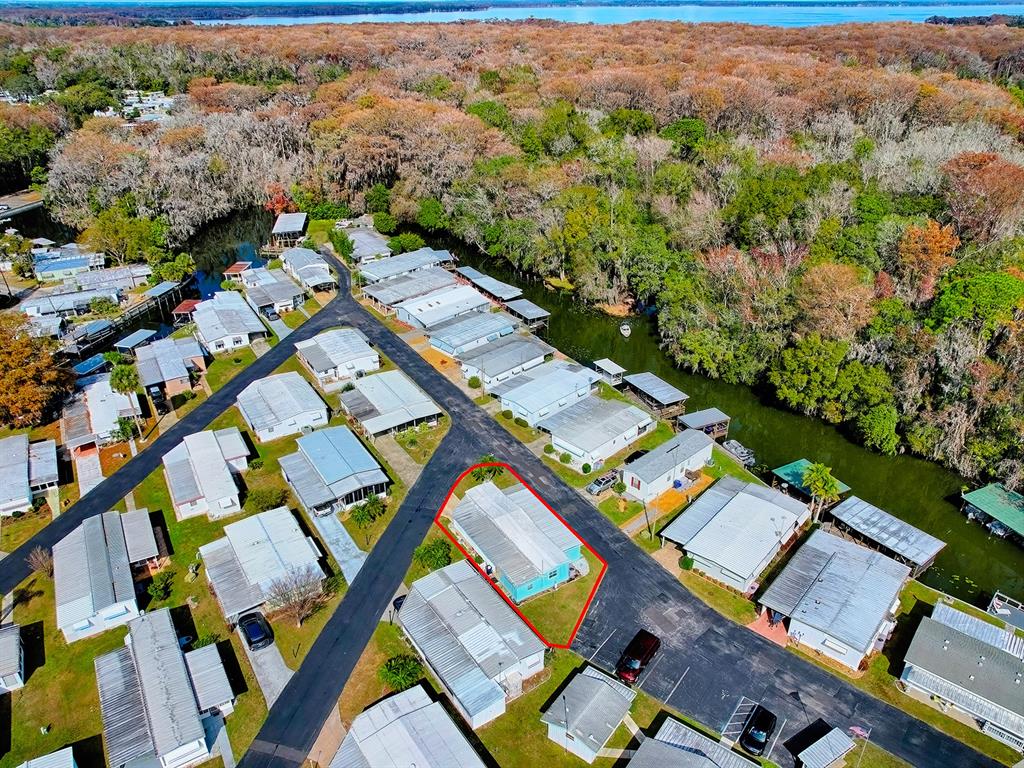 211 Rue De Paresse Tavares, FL 32778 - Photo 24 of 27 an aerial view of a city