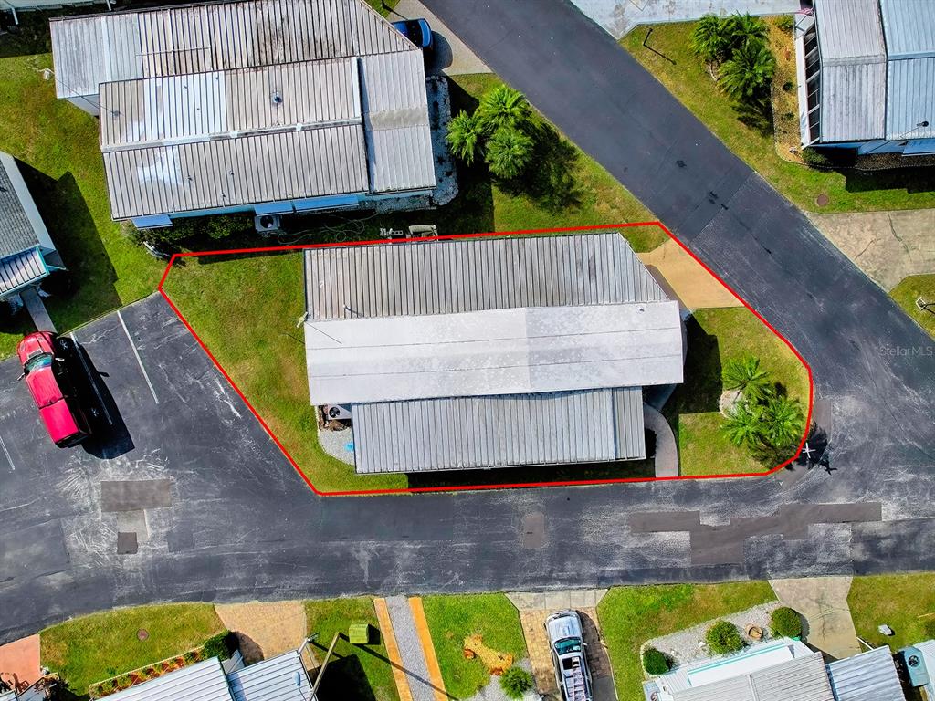 211 Rue De Paresse Tavares, FL 32778 - Photo 25 of 27 a view of outdoor space and barbecue grill