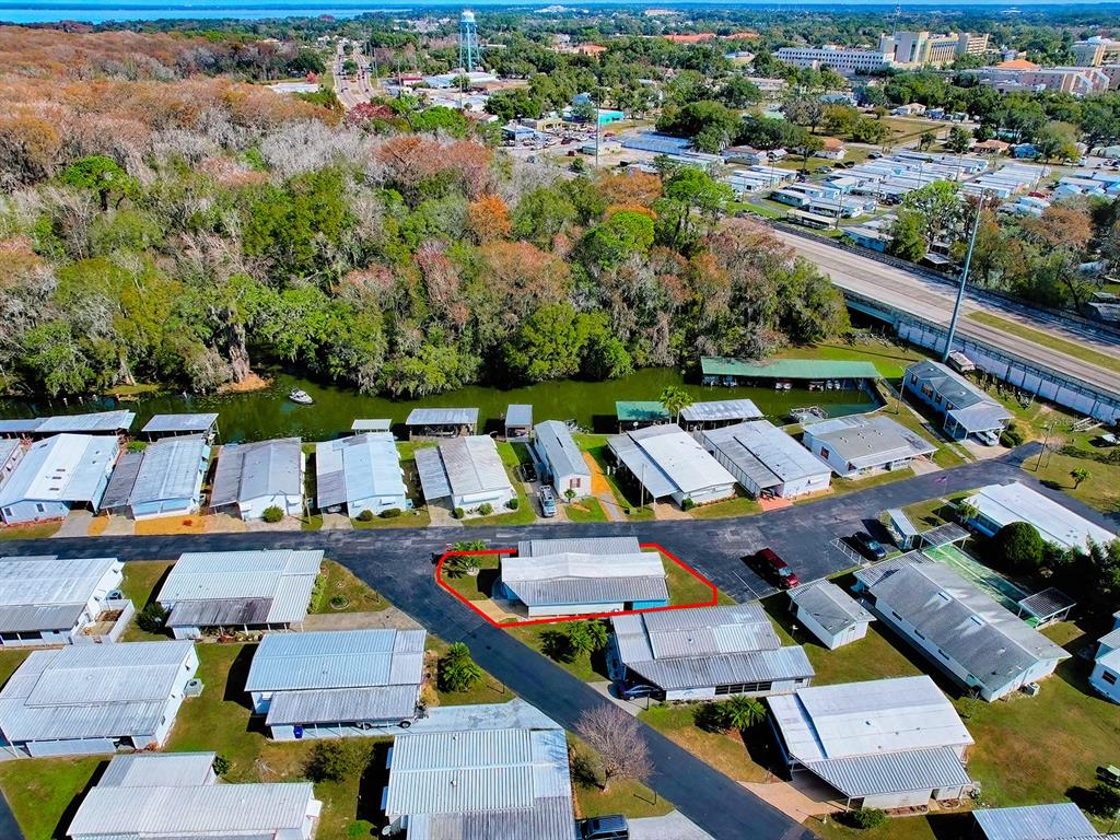 211 Rue De Paresse Tavares, FL 32778 - Photo 26 of 27 an aerial view of a city