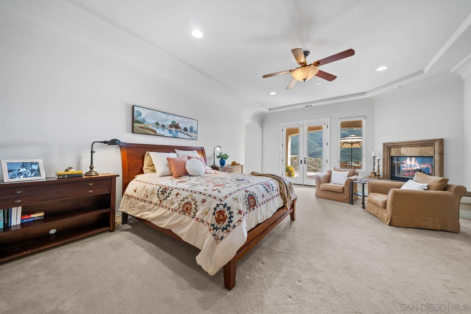 2247 Margarita Glen Fallbrook, CA 92028 - Photo 18 of 40 a bedroom with a bed couch and a window