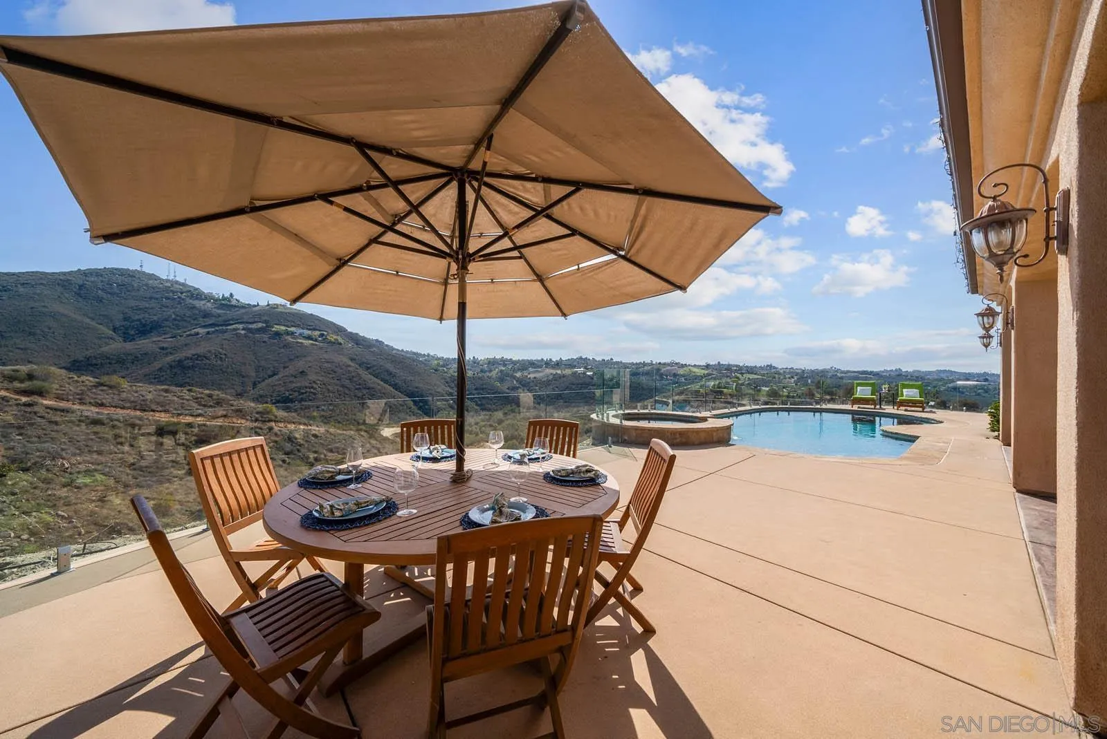 2247 Margarita Glen Fallbrook, CA 92028 - Photo 28 of 40 an outdoor space with furniture and umbrella