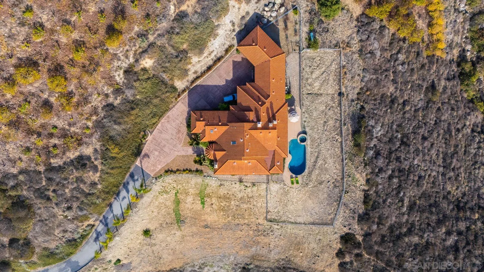 2247 Margarita Glen Fallbrook, CA 92028 - Photo 32 of 40 an aerial view of a house with swimming pool