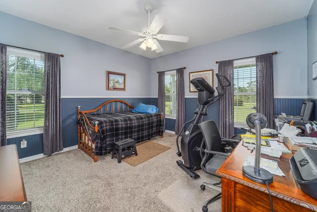 a room with furniture and a window