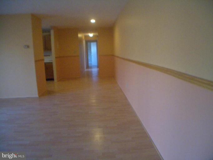 12007 Tarragon Road, Unit 12007 Reisterstown, MD 21136 - Photo 3 of 10 a view of a hallway