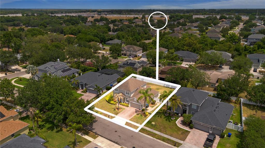 3333 Atmore Terrace Ocoee, FL 34761 - Photo 34 of 37 an aerial view of a house