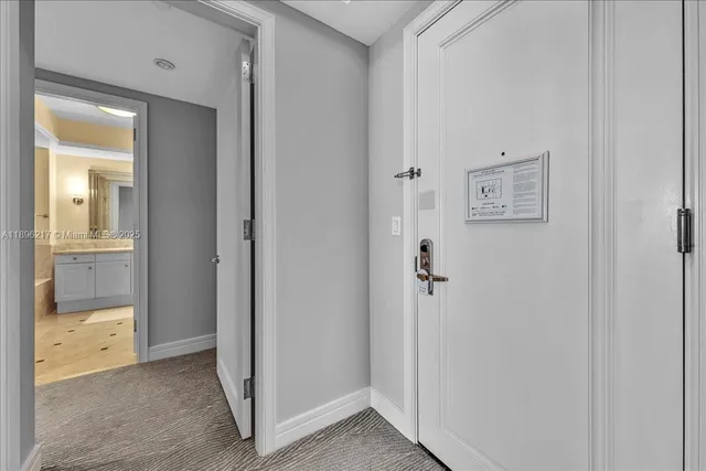 a spacious bathroom with a double vanity sink mirror and shower