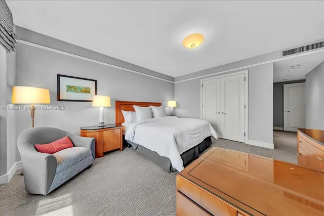 a room with furniture and a flat screen tv