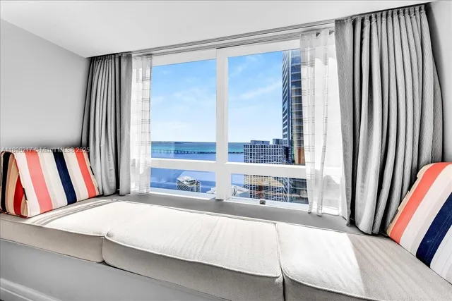 a view of a hallway to a bedroom