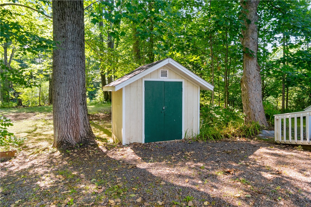 6925 Emerald Point Road Sodus, NY 14555 - Photo 15 of 32 The shed - lots of storage for all your garden nee
