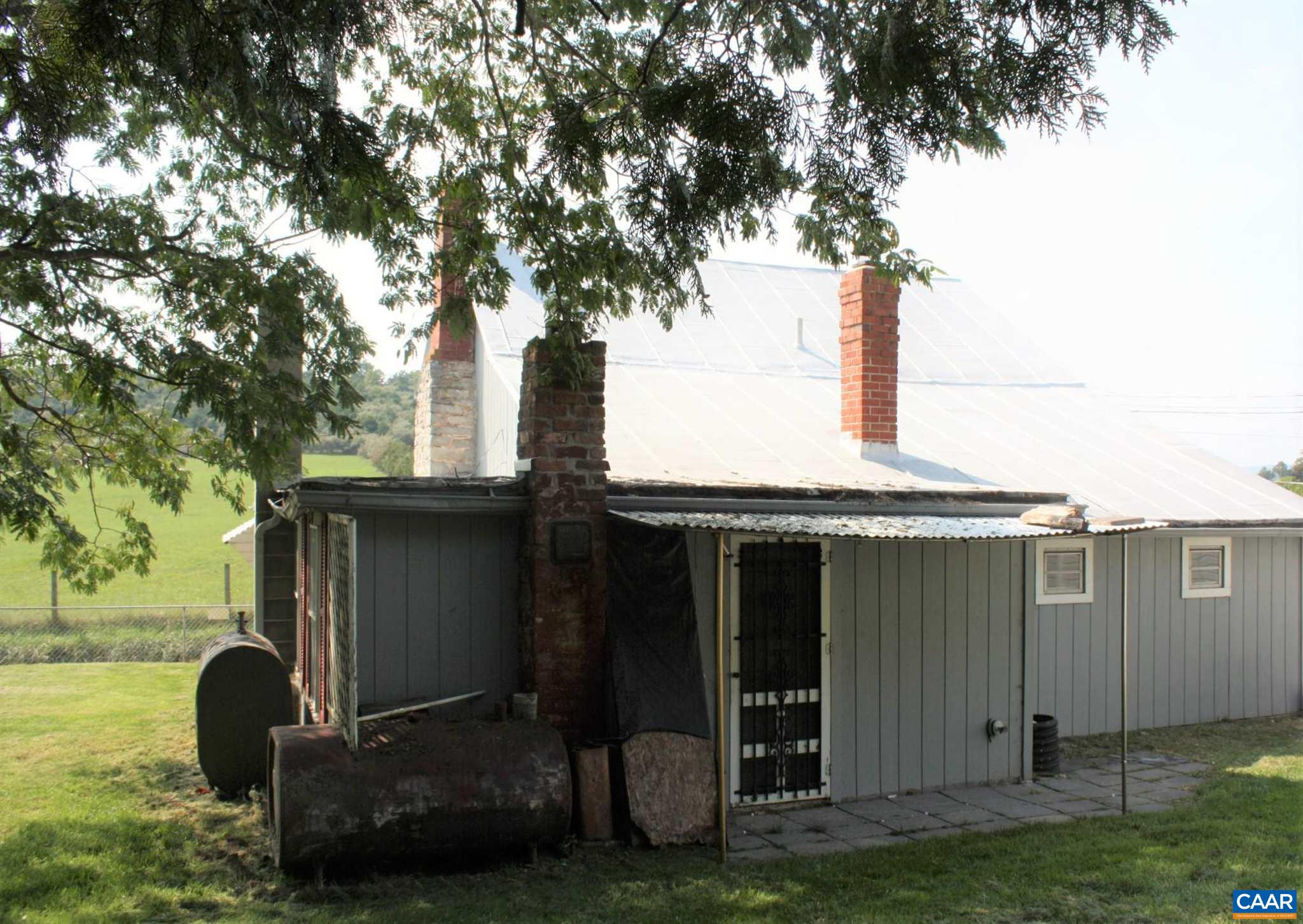 629 Carson Mill Road Steeles Tavern, VA 24476 - Photo 15 of 57 a front view of a house with garden