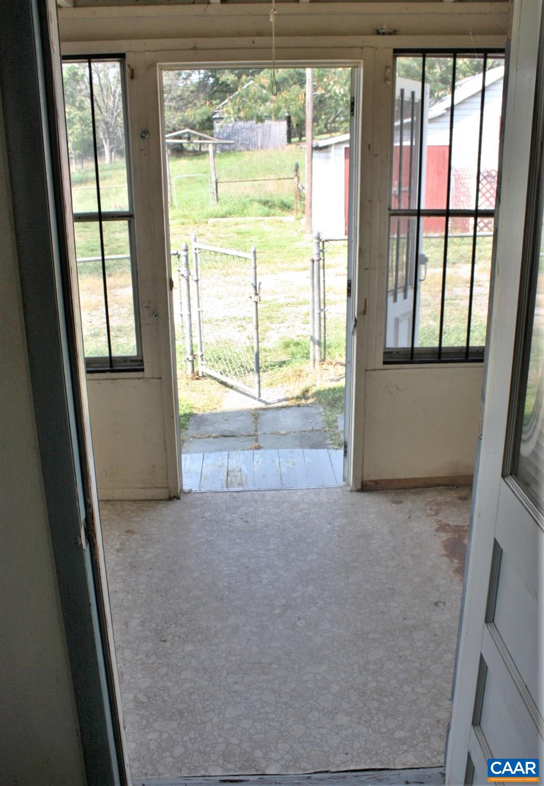 629 Carson Mill Road Steeles Tavern, VA 24476 - Photo 16 of 57 a view of an empty room with a fireplace