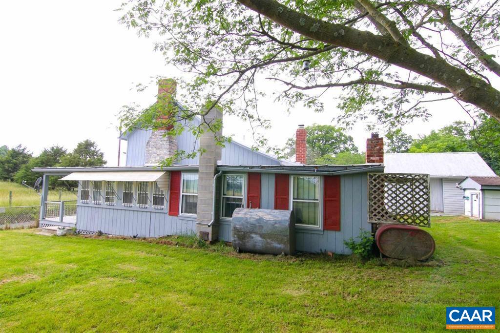 629 Carson Mill Road Steeles Tavern, VA 24476 - Photo 54 of 57 a view of a house with backyard and a tree
