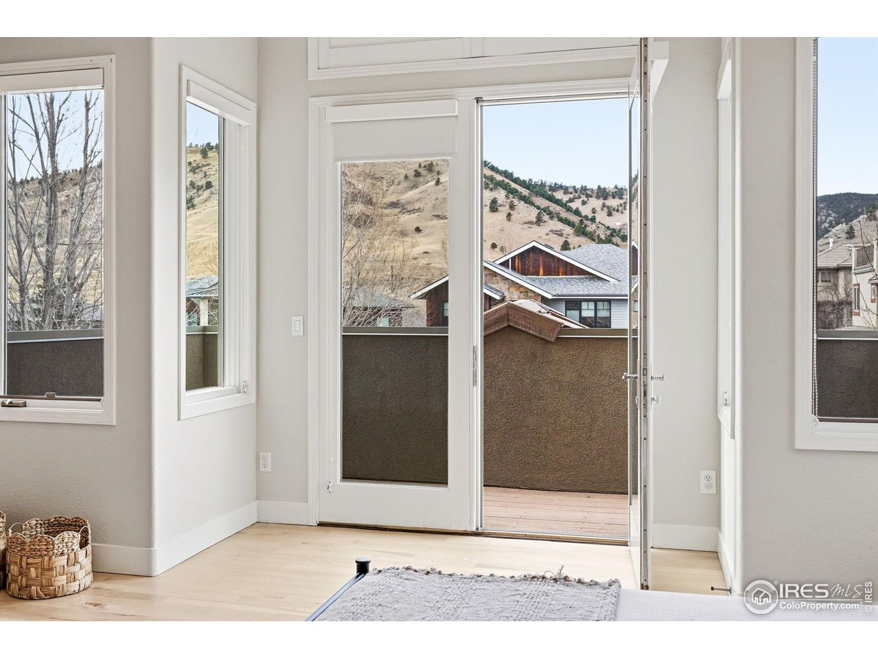 4840 6th Street Boulder, CO 80304 - Photo 17 of 43 The primary bedroom's west-facing deck takes in the stunning foothills views.