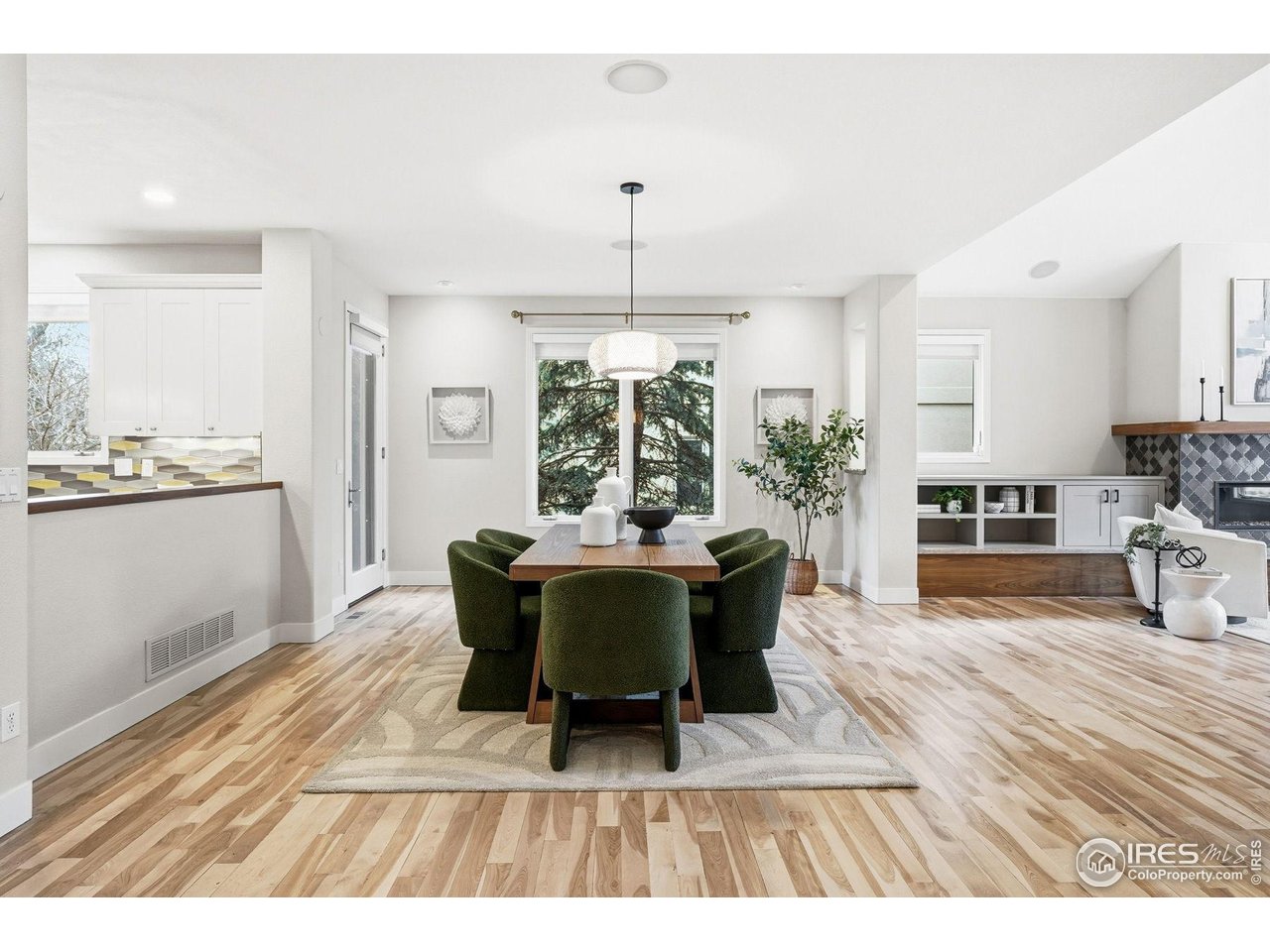 4840 6th Street Boulder, CO 80304 - Photo 9 of 43 An impressive dining room anchors the space between the kitchen and living room.