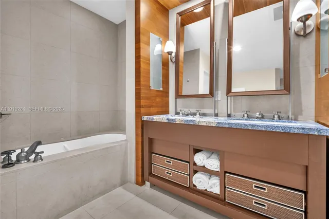 a spacious bedroom with a bed and a window