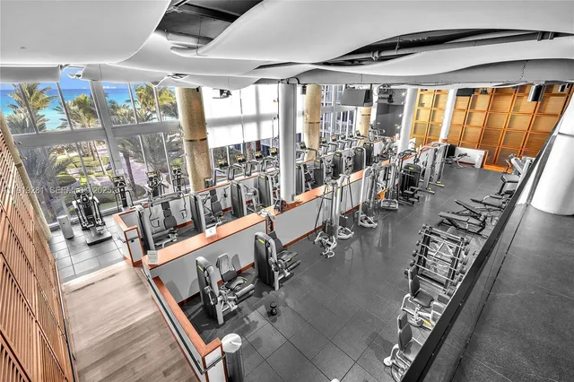 a view of a hallway with dining area