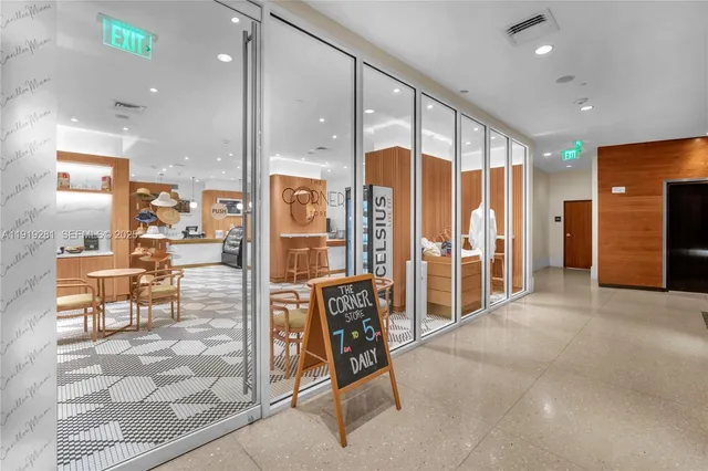 a living room with a couch and a rug floor