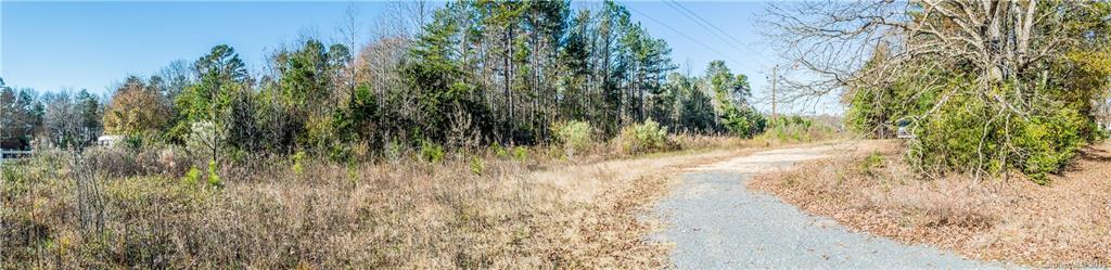 0 Legion Road Fort Mill, SC 29715 - Photo 2 of 4 a view of a yard with plants and wooden fence
