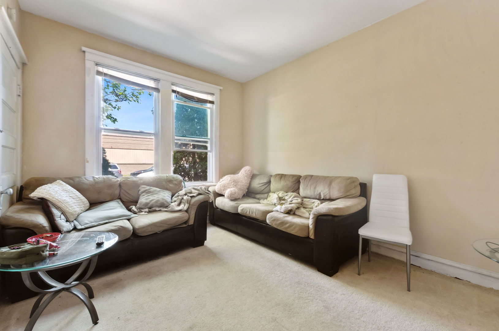 4411 West Haddon Avenue Chicago, IL 60651 - Photo 14 of 21 a living room with furniture and a window