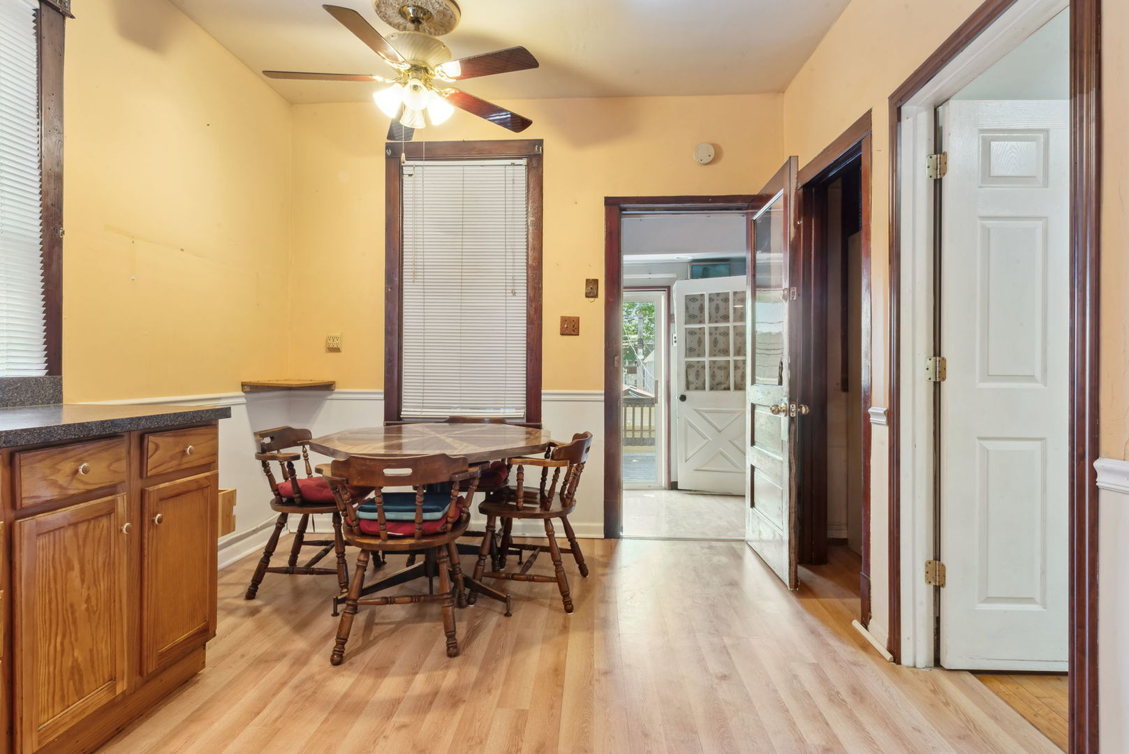 4411 West Haddon Avenue Chicago, IL 60651 - Photo 4 of 21 a view of a dining room with furniture and wooden floor