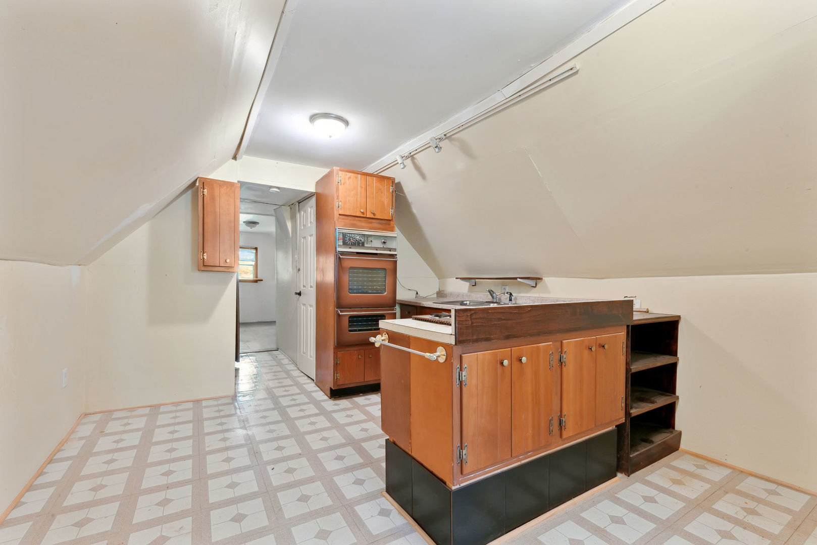 4411 West Haddon Avenue Chicago, IL 60651 - Photo 10 of 21 a kitchen with a stove and a refrigerator