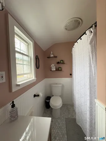 a view of livingroom with hardwood floor and hallway