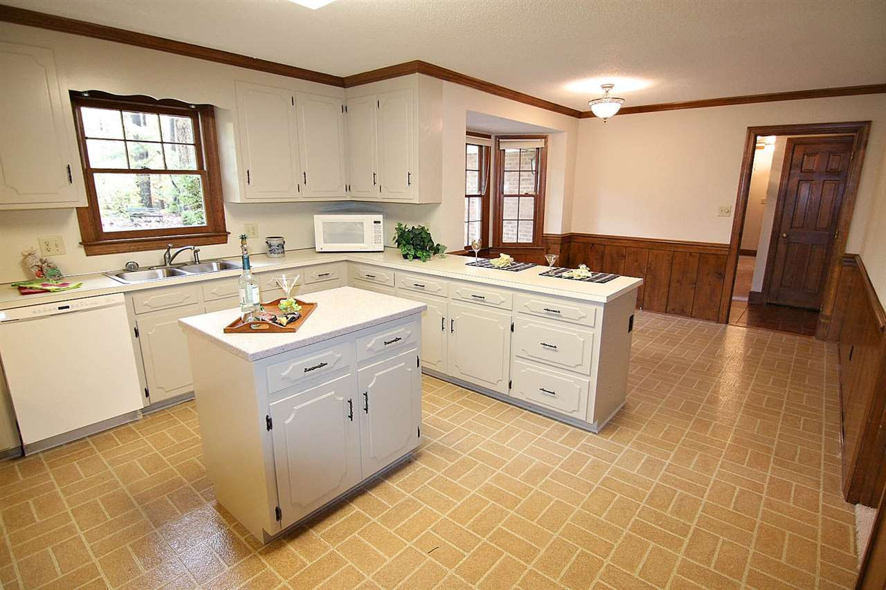 2816 Mattlyn Court Raleigh, NC 27613 - Photo 11 of 25 Kitchen has an Incredible Amount of Counter Space + Center Island Kitchen