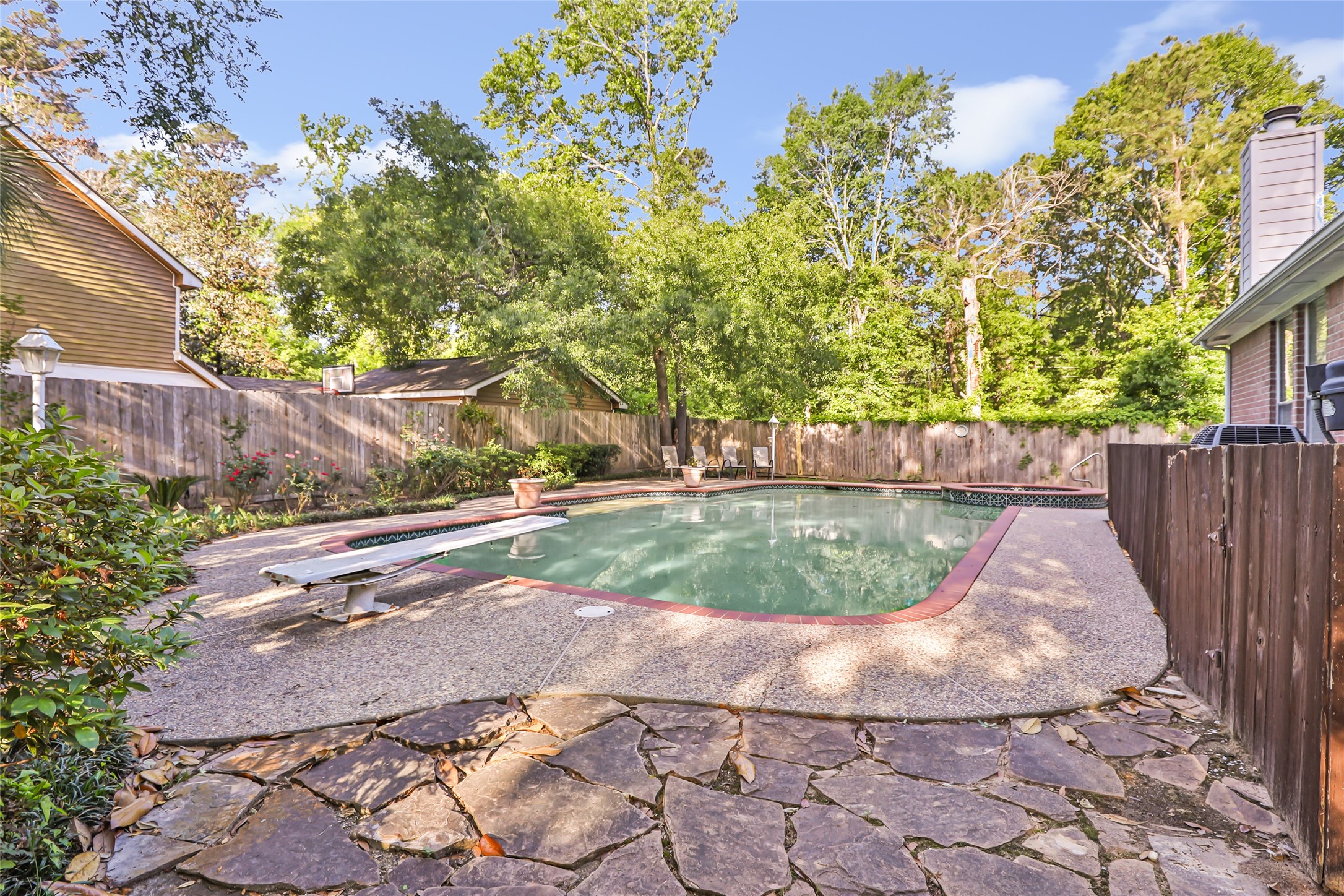 1014 North Rivershire Drive Conroe, TX 77304 - Photo 12 of 37 a view of outdoor space and yard