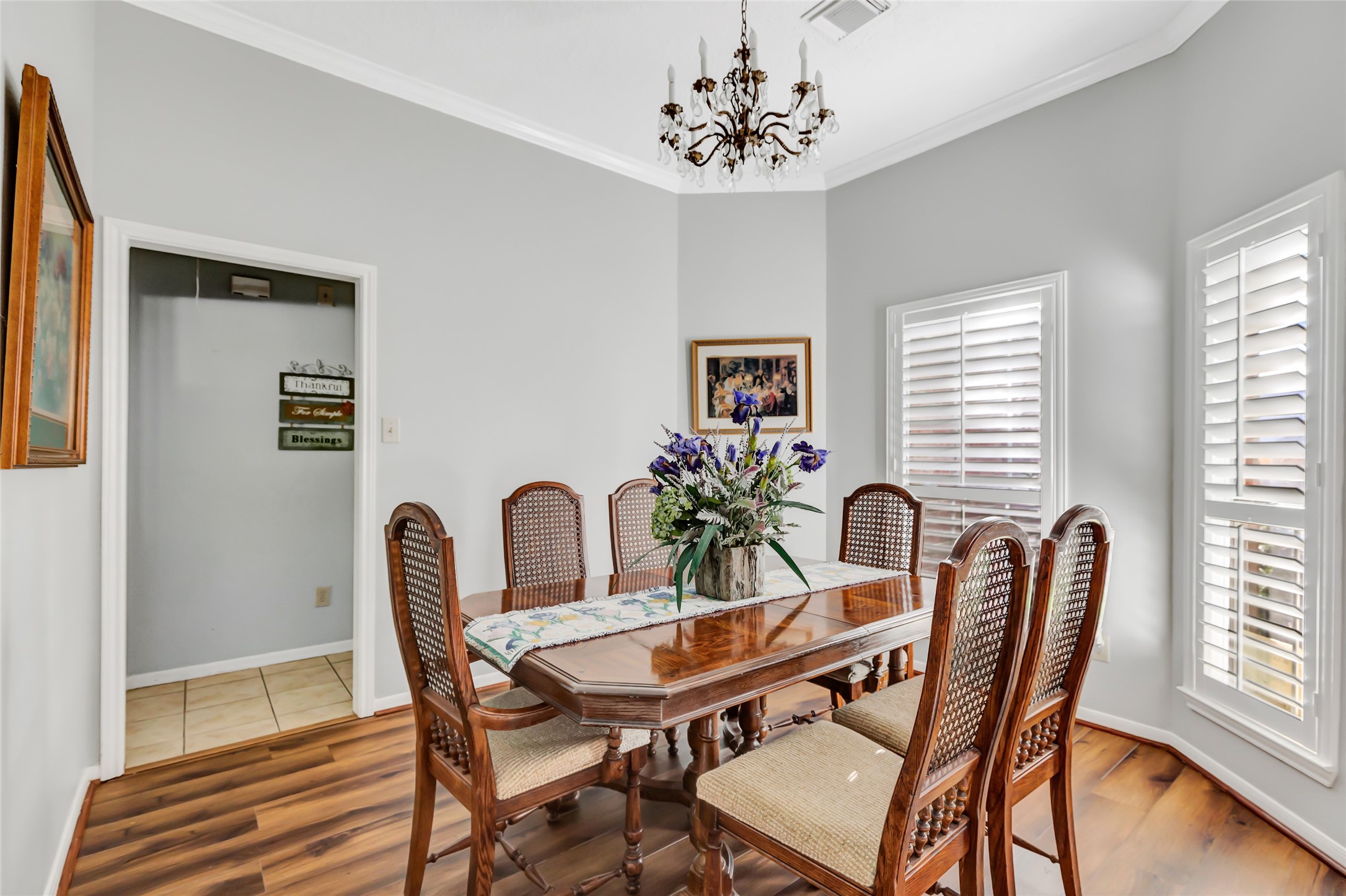 1014 North Rivershire Drive Conroe, TX 77304 - Photo 20 of 37 a view of a dining room with furniture window and wooden floor