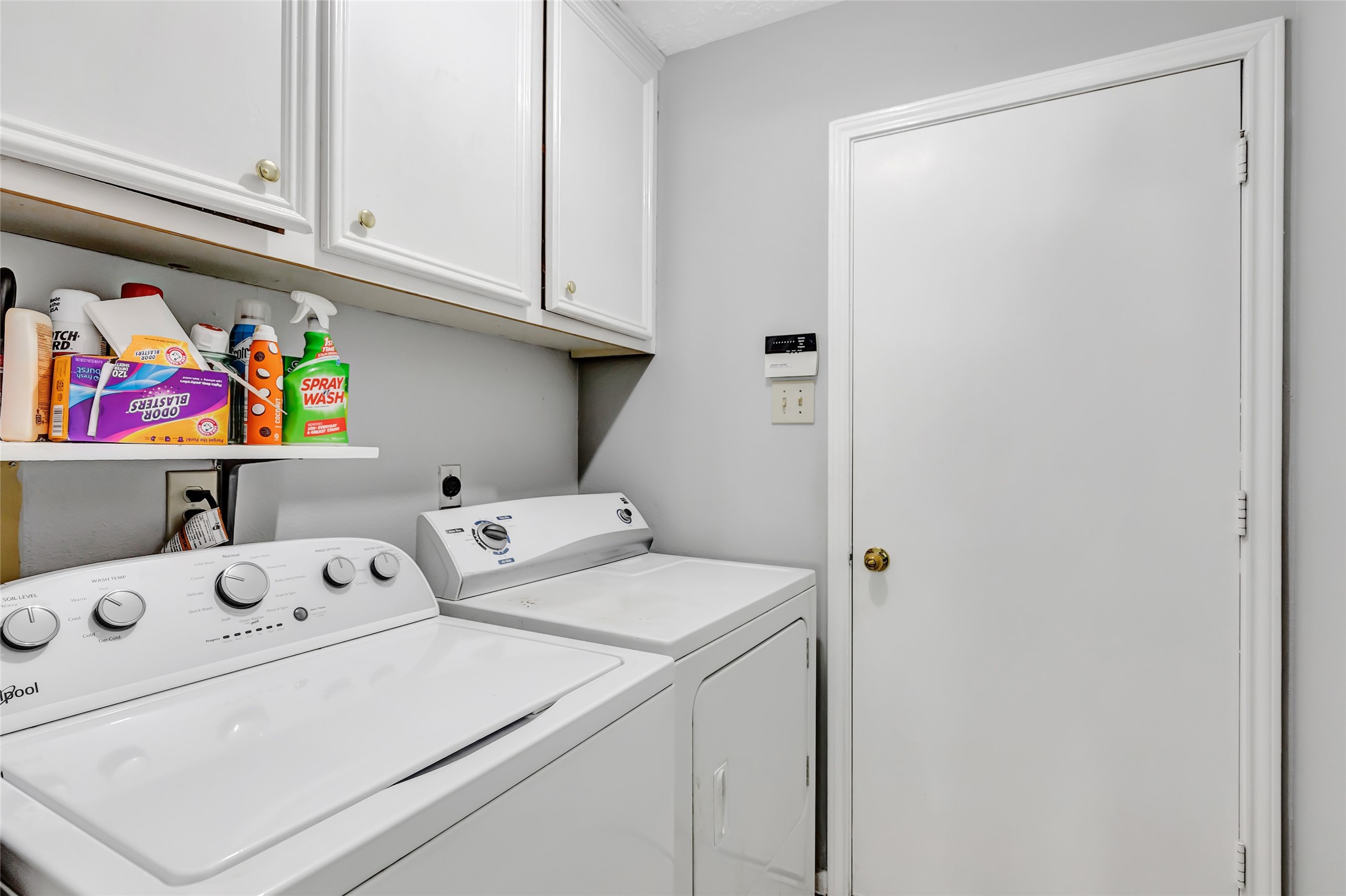 1014 North Rivershire Drive Conroe, TX 77304 - Photo 33 of 37 a utility room with dryer and washer